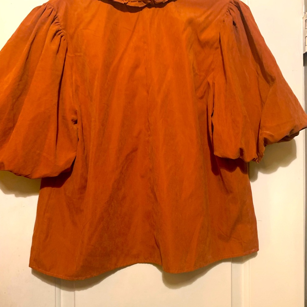 Suede material top , never worn